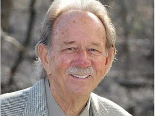 Senior man smiling with restored healthy teeth in Annapolis, MD