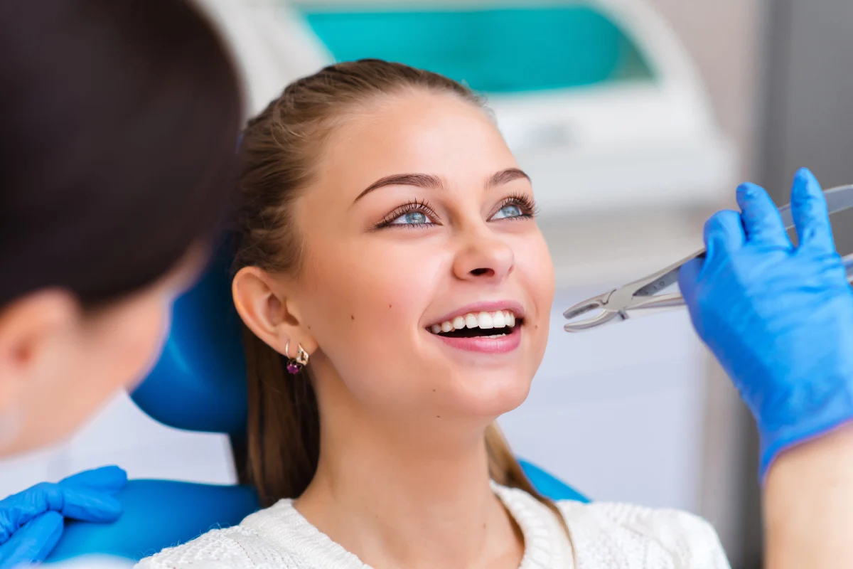 woman during tooth extraction treatment in Annapolis, MD